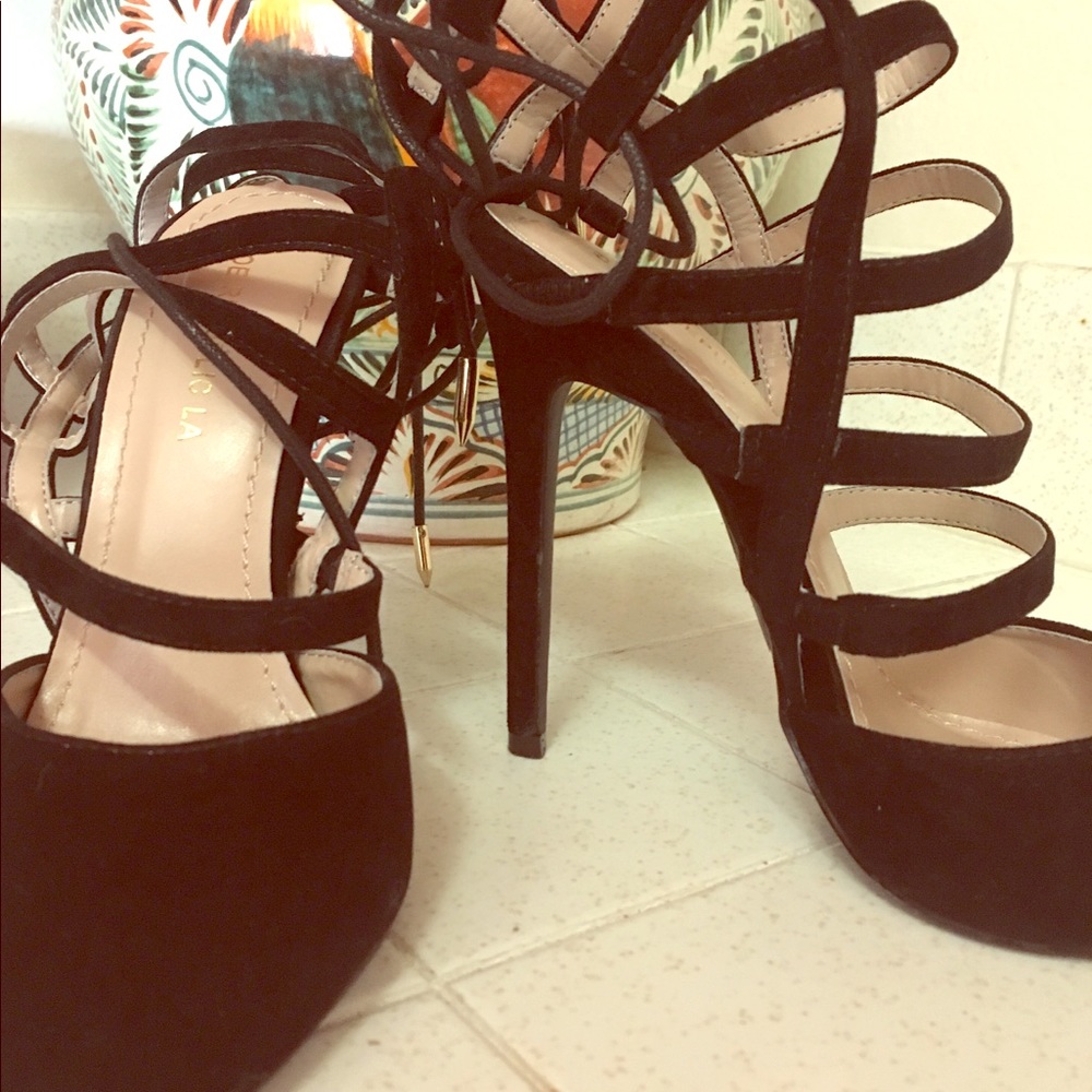 Size 6.5”, 4” heel, ankle straps, very sexy, black